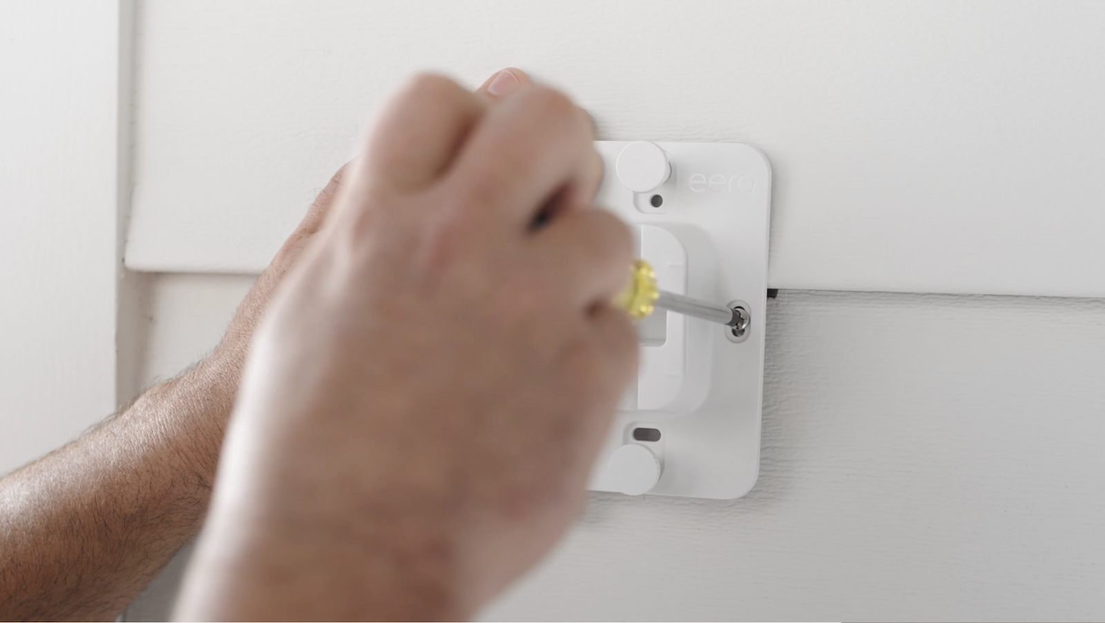 tightening screws in mountain bracket