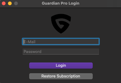 An image of the Guardian app log in screen, with sections to input an email and a password.